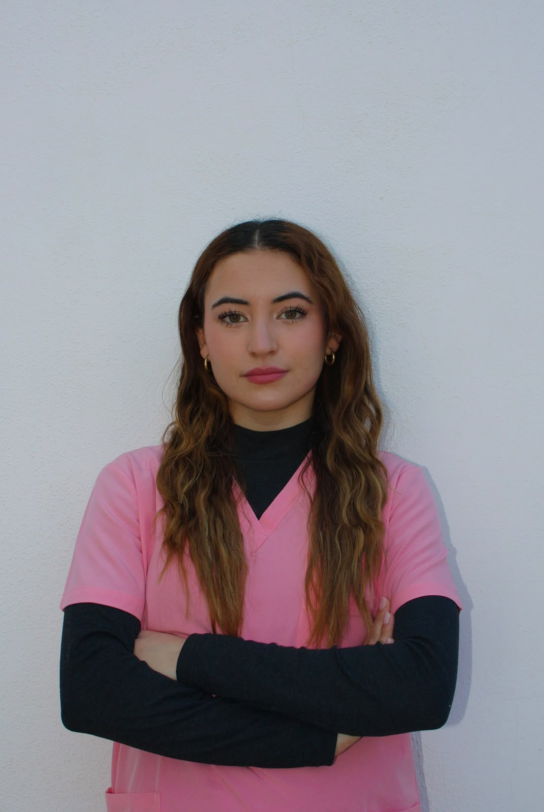 Paula De la Vega con uniforme sanitario rosa